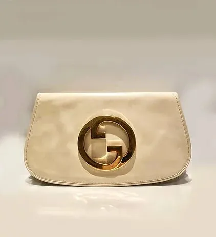 1980s GUCCI BLONDIE UNICORN INTERLOCKING GOLD LOGO CLUTCH BAG