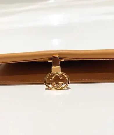 1980s Gucci Brown Cream interlocking logo clutch monogram wallet