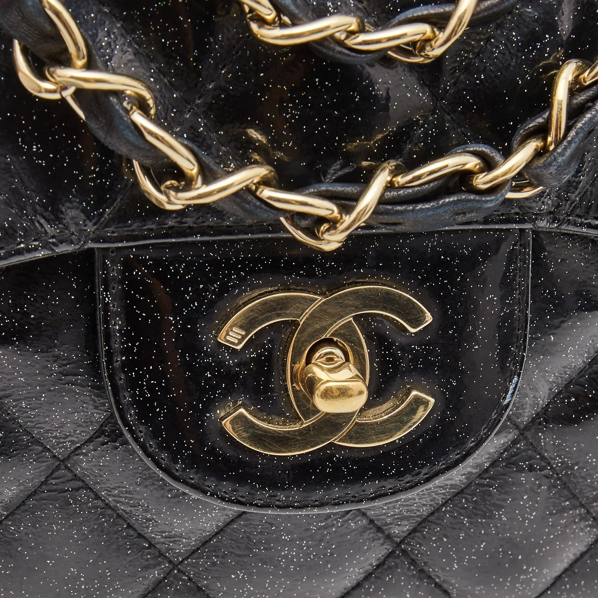 CHANEL Black Quilted Glitter Patent Leather Jumbo Classic Single Flap Bag